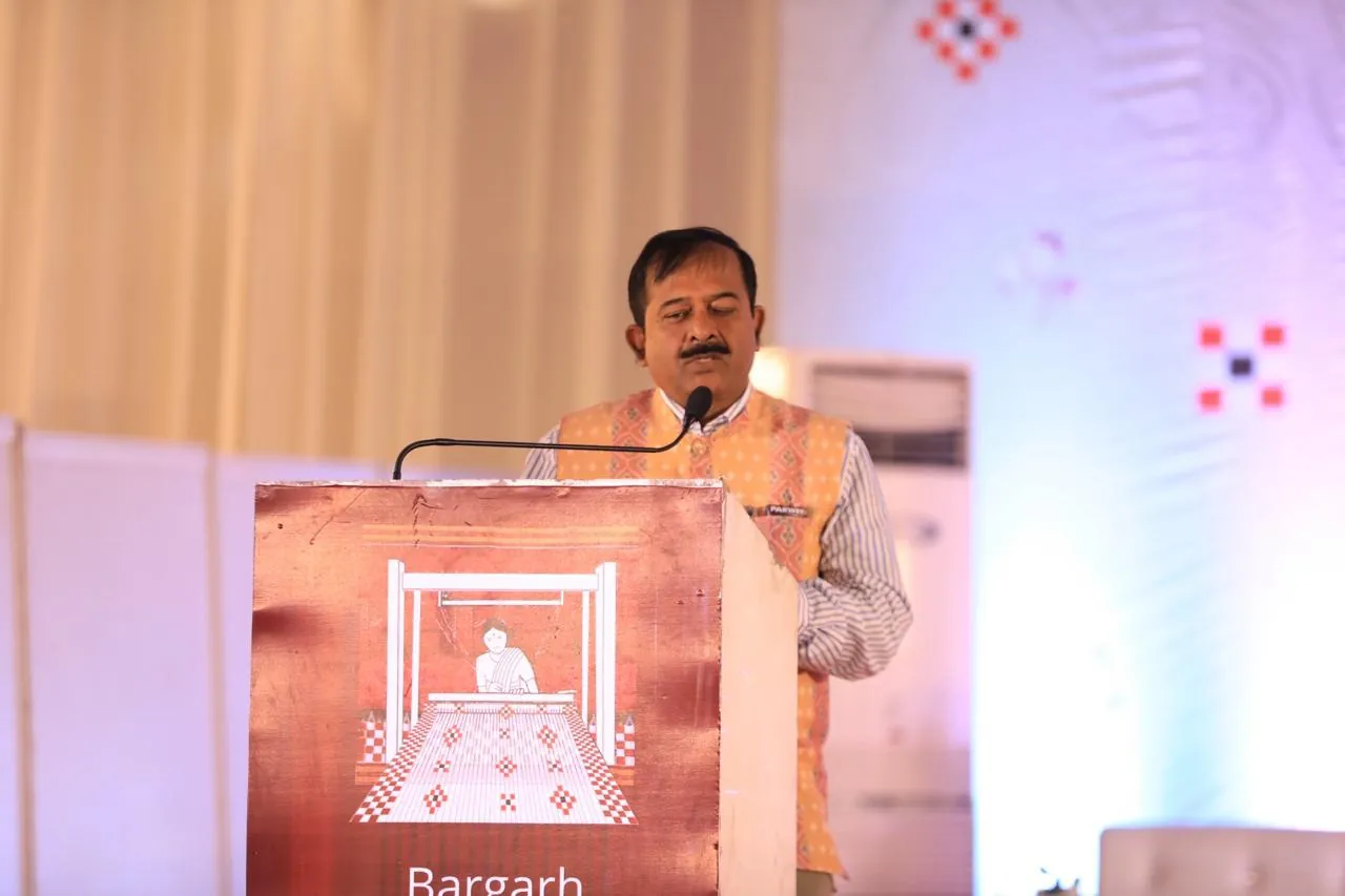 A speaker at the summit podium
