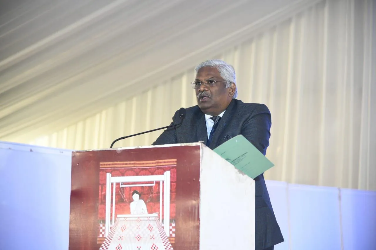 A speaker at the summit podium