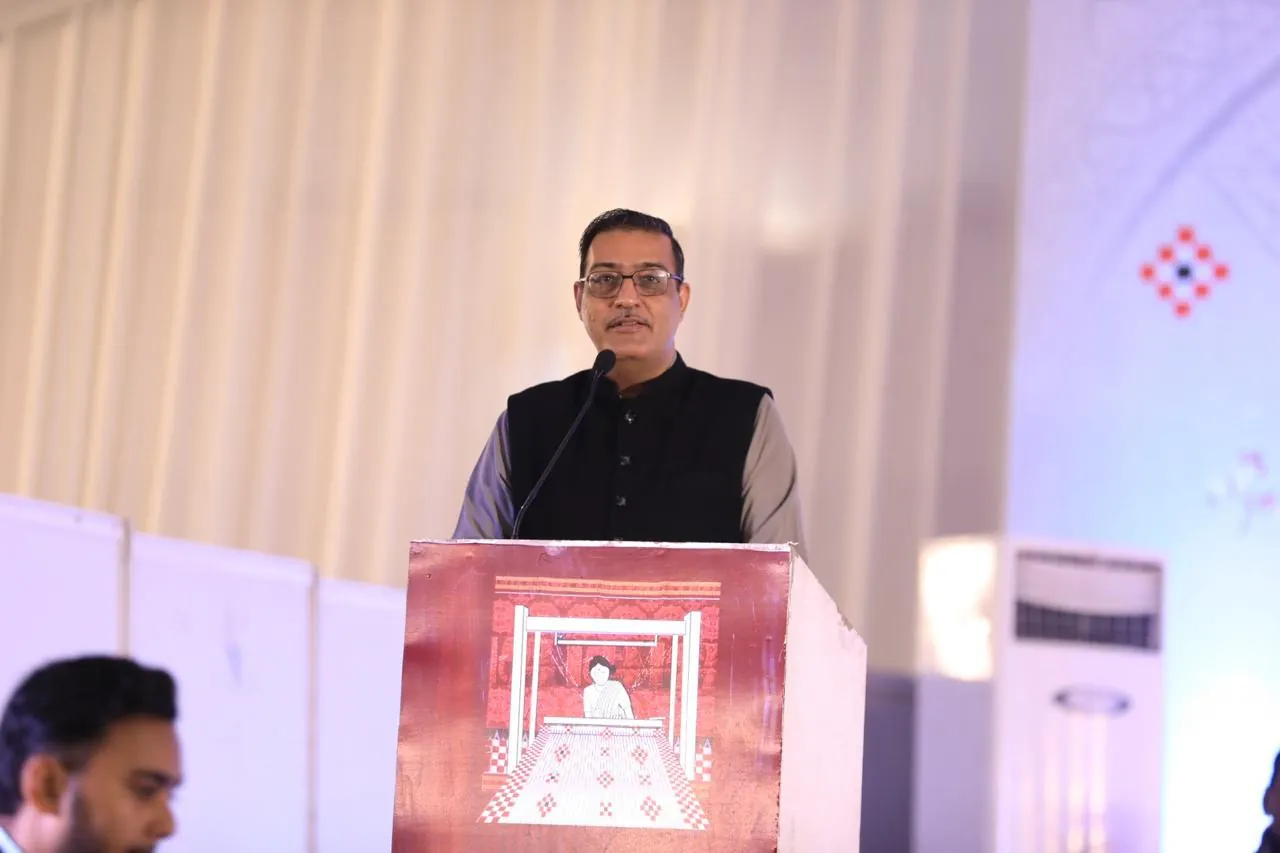A speaker at the summit podium