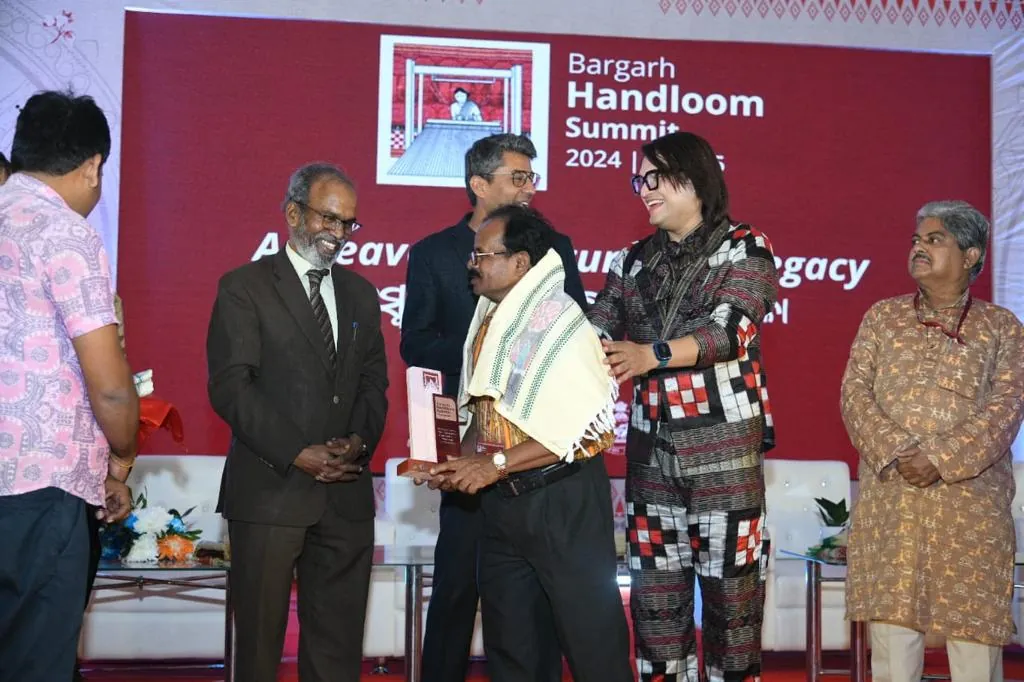 Felicitation on stage at the summit