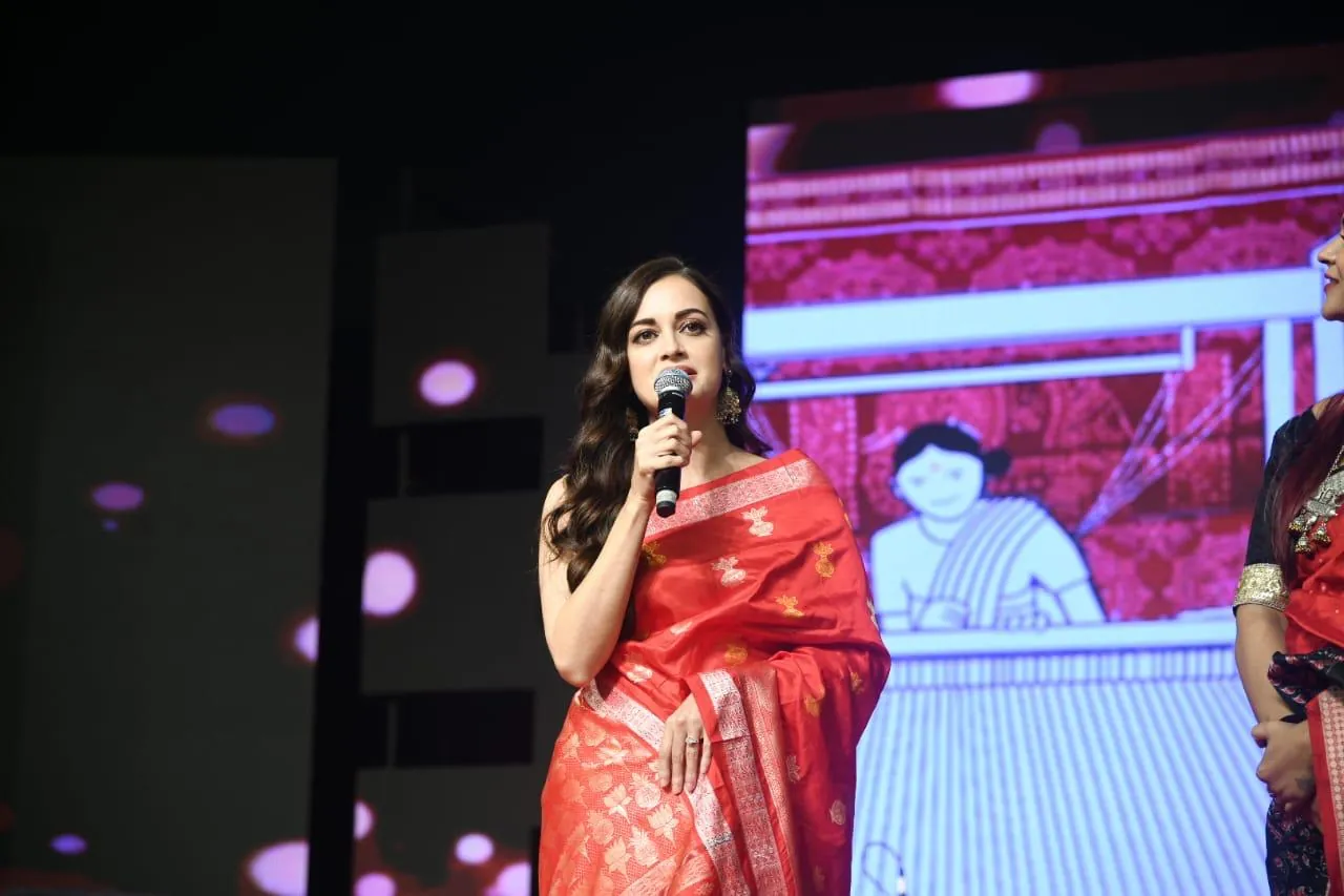 The host on stage at the summit