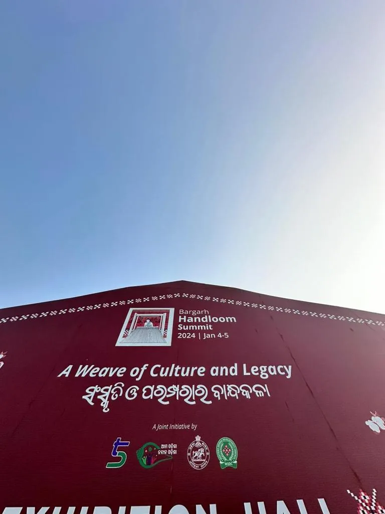 Exhibition hall entrance signage at the summit